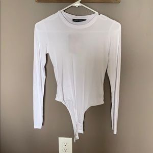 Naked wardrobe long sleeve bodysuit
